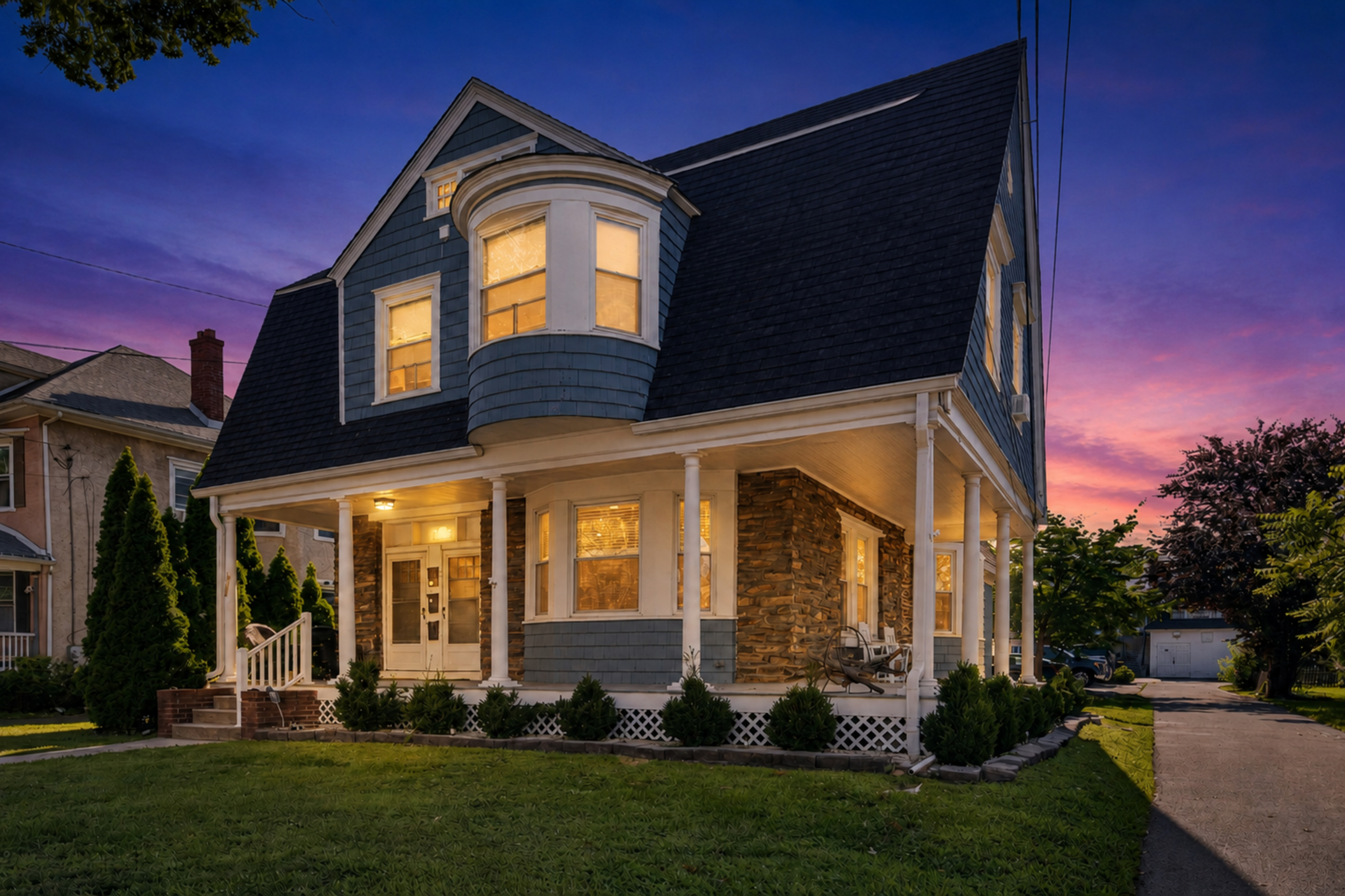 Well-lit front grounds and driveway providing secure, easy evening arrivals.
