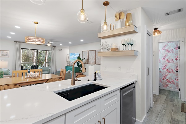 Fully Equipped Modern Kitchen: Prepare your favorite meals in our brand new fully remodeled and fully equipped kitchen with stainless steel appliances and ample counter space.