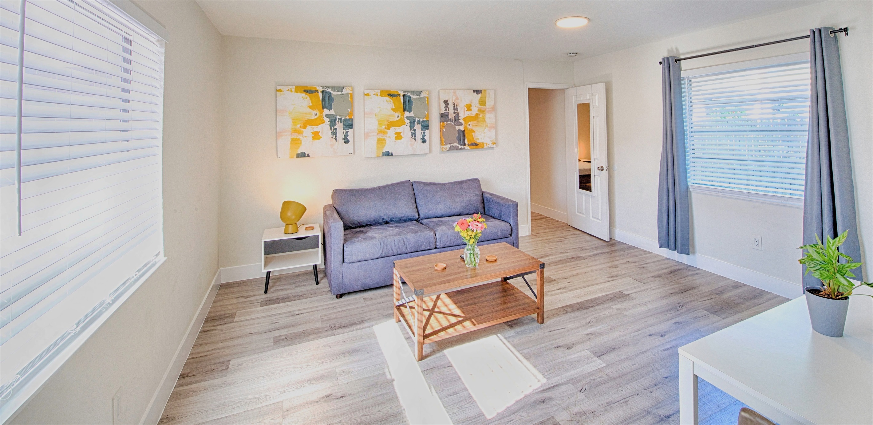 Featuring living room with coffee table, queen sofa pull out can sleep two guests comfortably.