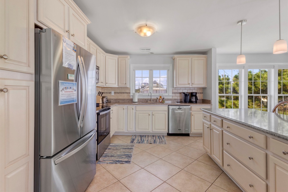 The large kitchen offers plenty of storage and counter space. Pots, pans, plates, cups, glasses, utensils plus much more are provided.