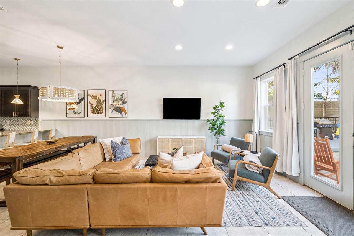 Relax and unwind in a bright, airy living area designed for comfort and style. Plush seating, natural light, and thoughtful décor create the perfect space to gather with family or friends.