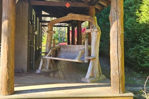 Embrace the beauty of the view or the wonderful hand carved bench! 