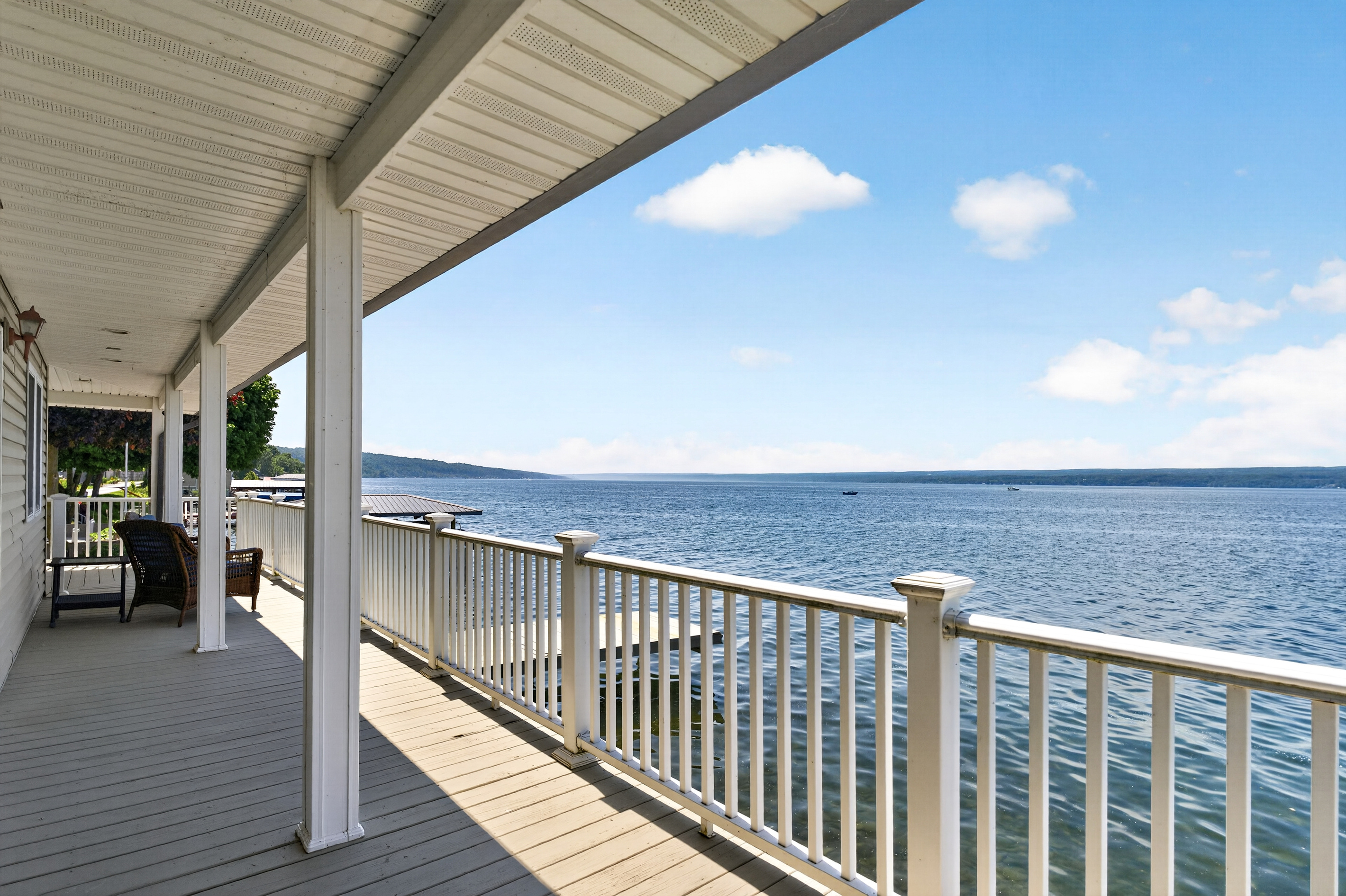 Lake view framed by the deck railing