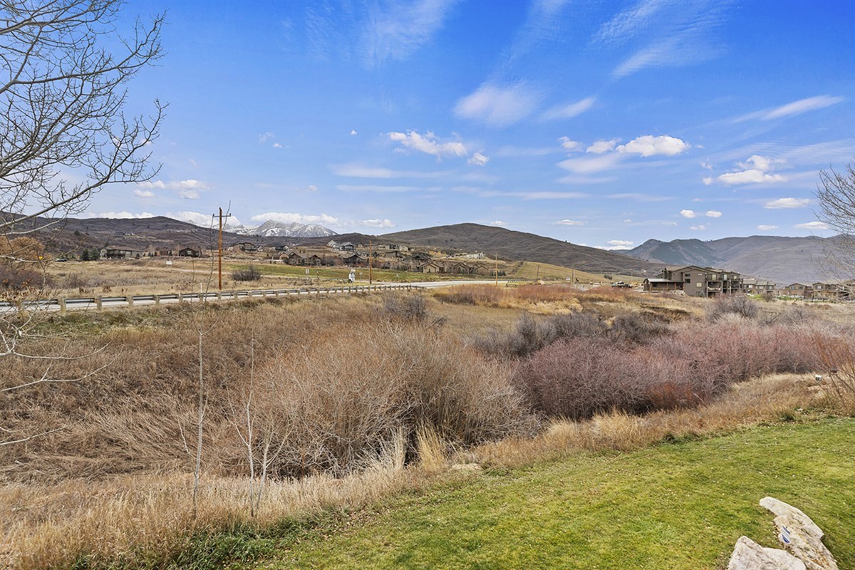 Expansive valley views stretch beyond the property, offering open space, natural beauty, and a true sense of tranquility.