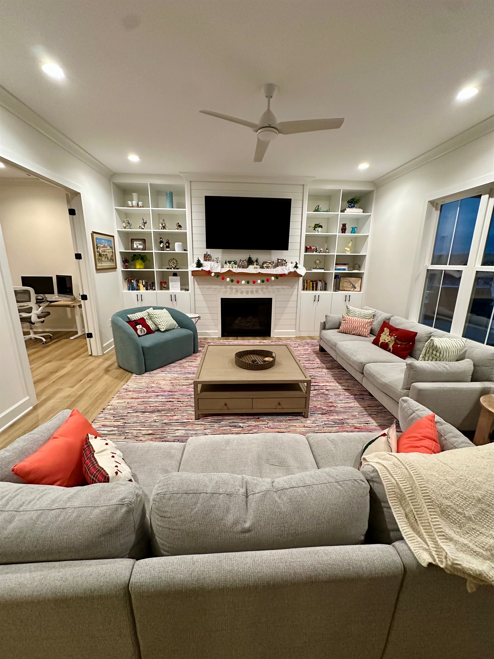 Gather in the beautifully decorated living room and relax by the fireplace while taking in peaceful lake views.