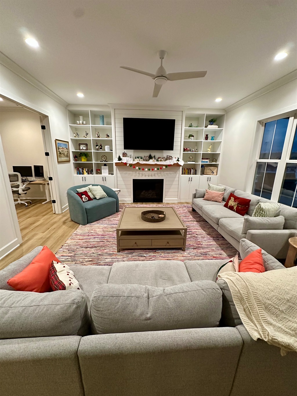 Gather in the beautifully decorated living room and relax by the fireplace while taking in peaceful lake views.