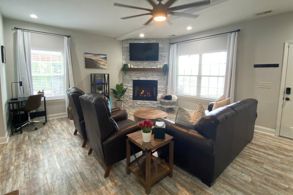 Cozy up to the fireplace in our "modern rustic" living room. 