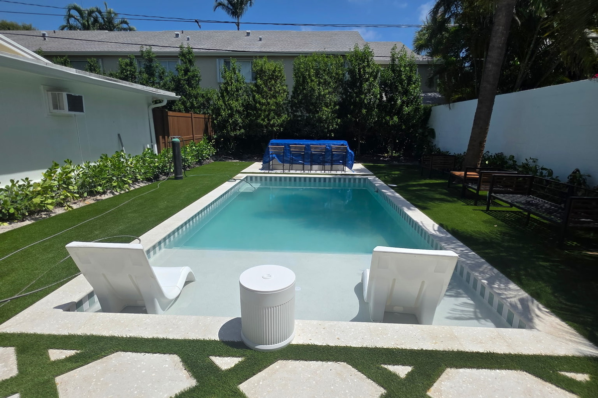 A beautifully manicured, private retreat designed for ultimate outdoor living.