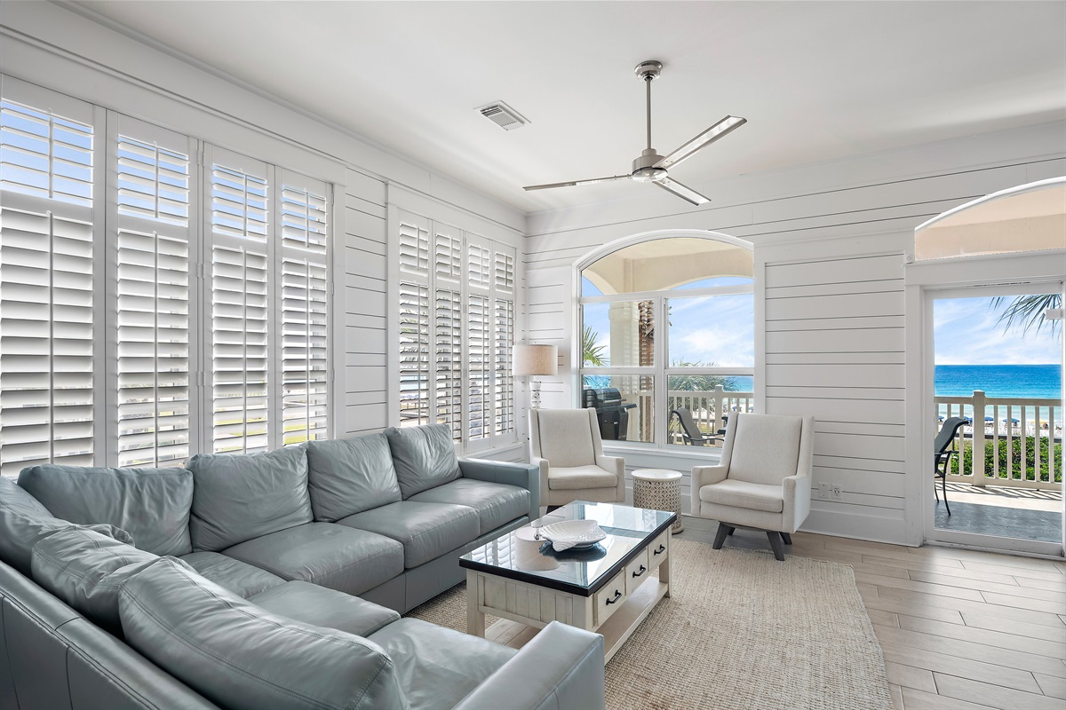 The Living Room features tons of comfortable seating, all new leather furniture, situated around a large Smart TV with incredible Gulf views - Come and Relax!