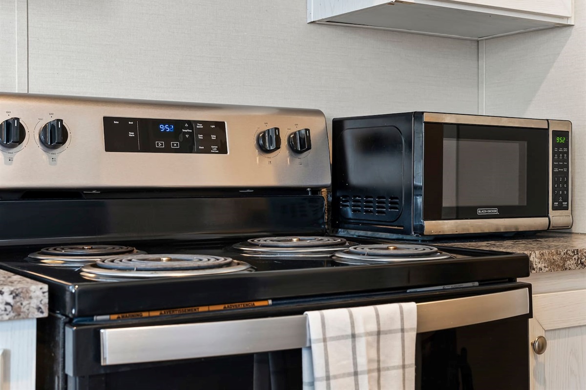 Microwave and cooking station with all the basics you need for quick and simple meals.