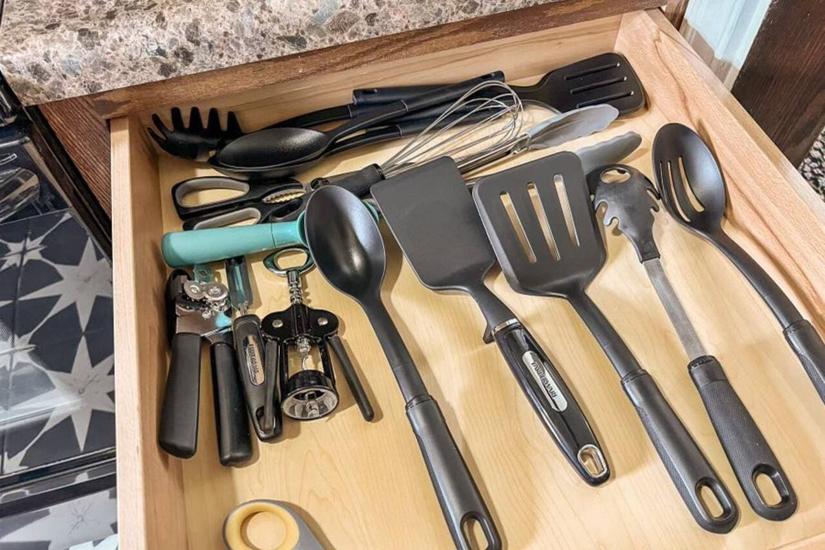 Complete kitchen toolkit including scissors, whisk, and other essentials for all your cooking needs.