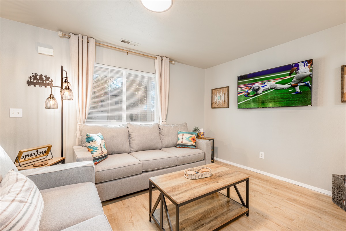 3006 Regan – Living Room
Bright and comfortable living space with seating and smart TV.