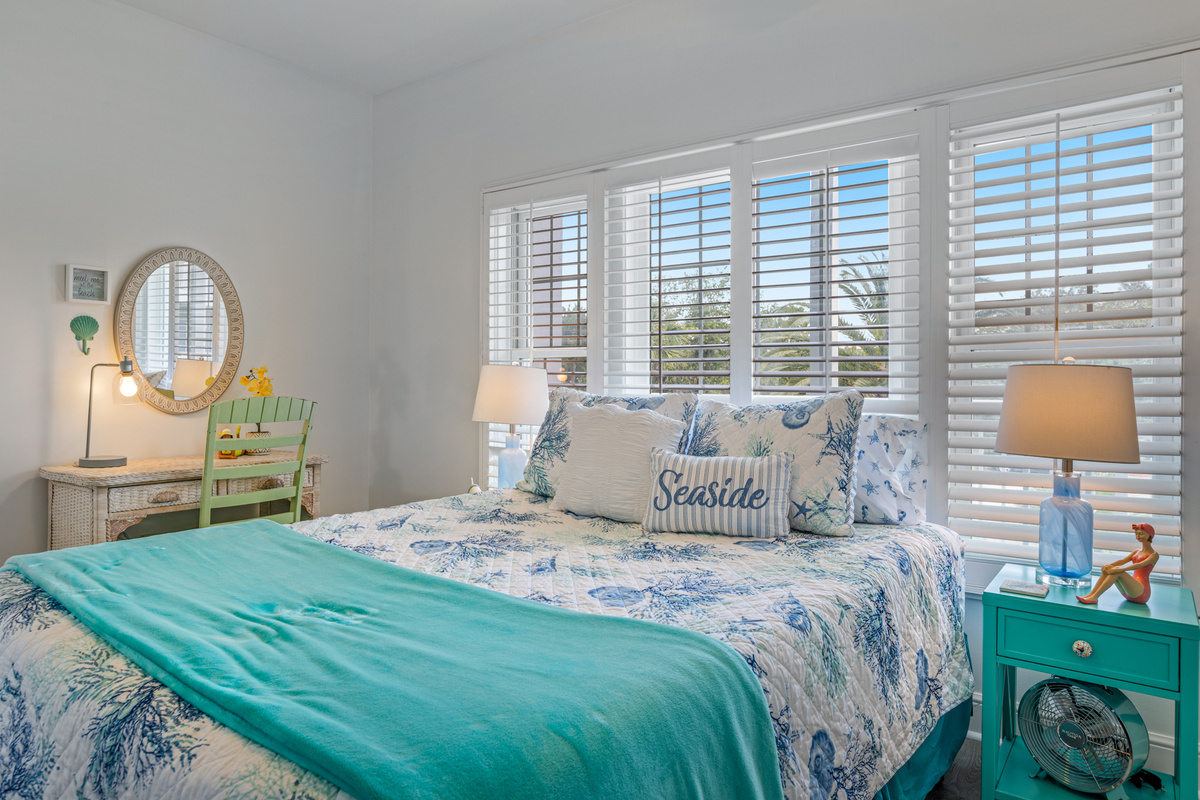 Guest bedroom with desk and queen size Purple brand mattress