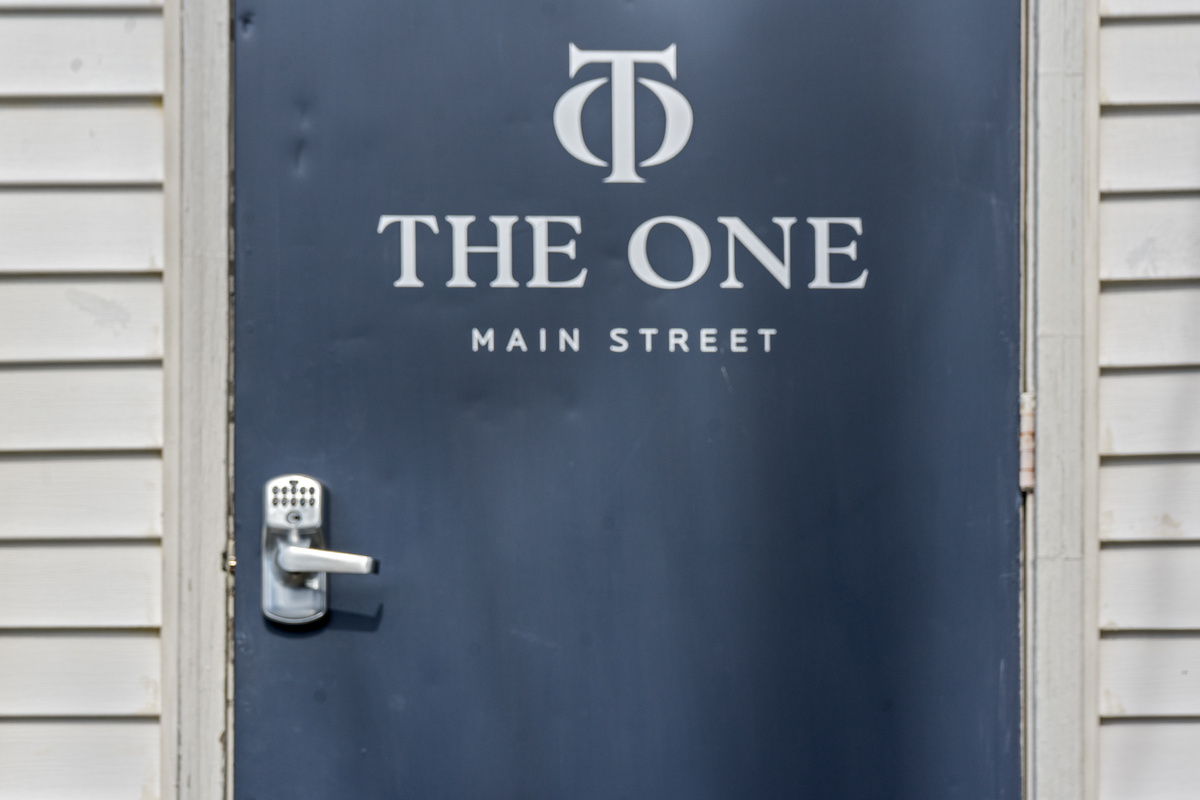 Your private entrance off Access Alley. Spot the silver property logo decal on the door and use your unique digital key code for a seamless, contactless check-in. A quiet retreat right in the center of downtown Bar Harbor.