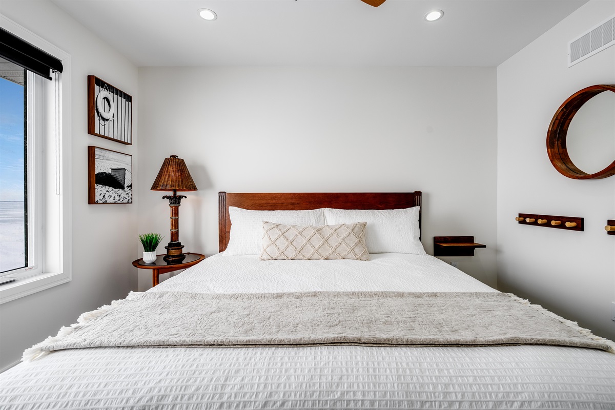 King bedroom with A perfect blend of modern calm and warmth.