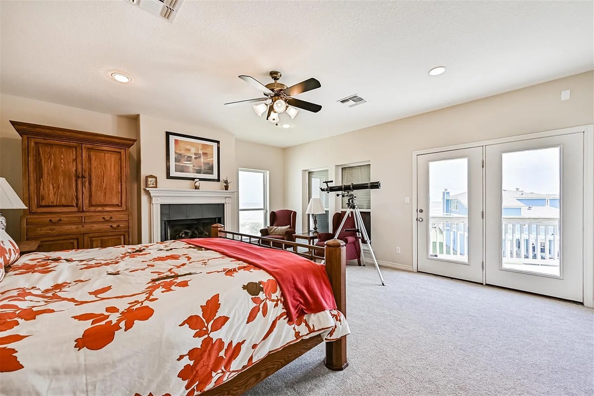 Another large Primary Bedroom is in its own wing with fireplace, deck and ensuite bathroom