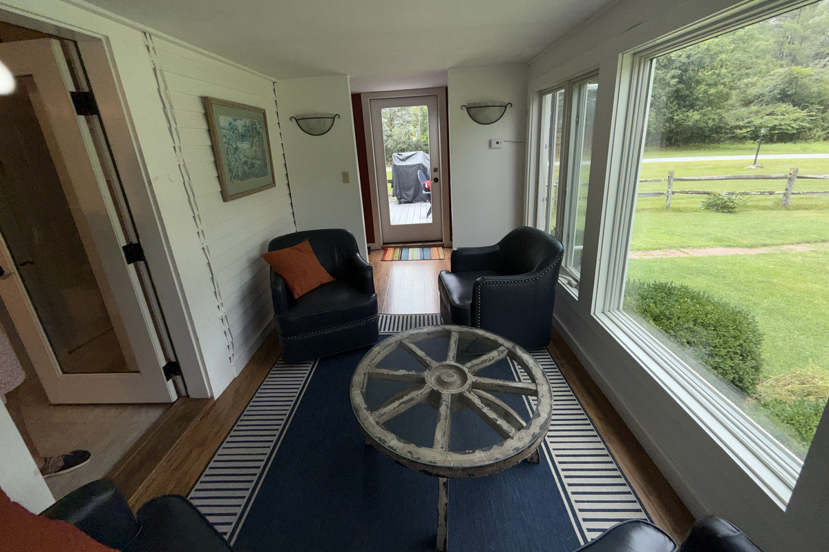 Sun-filled sitting room with peaceful garden views