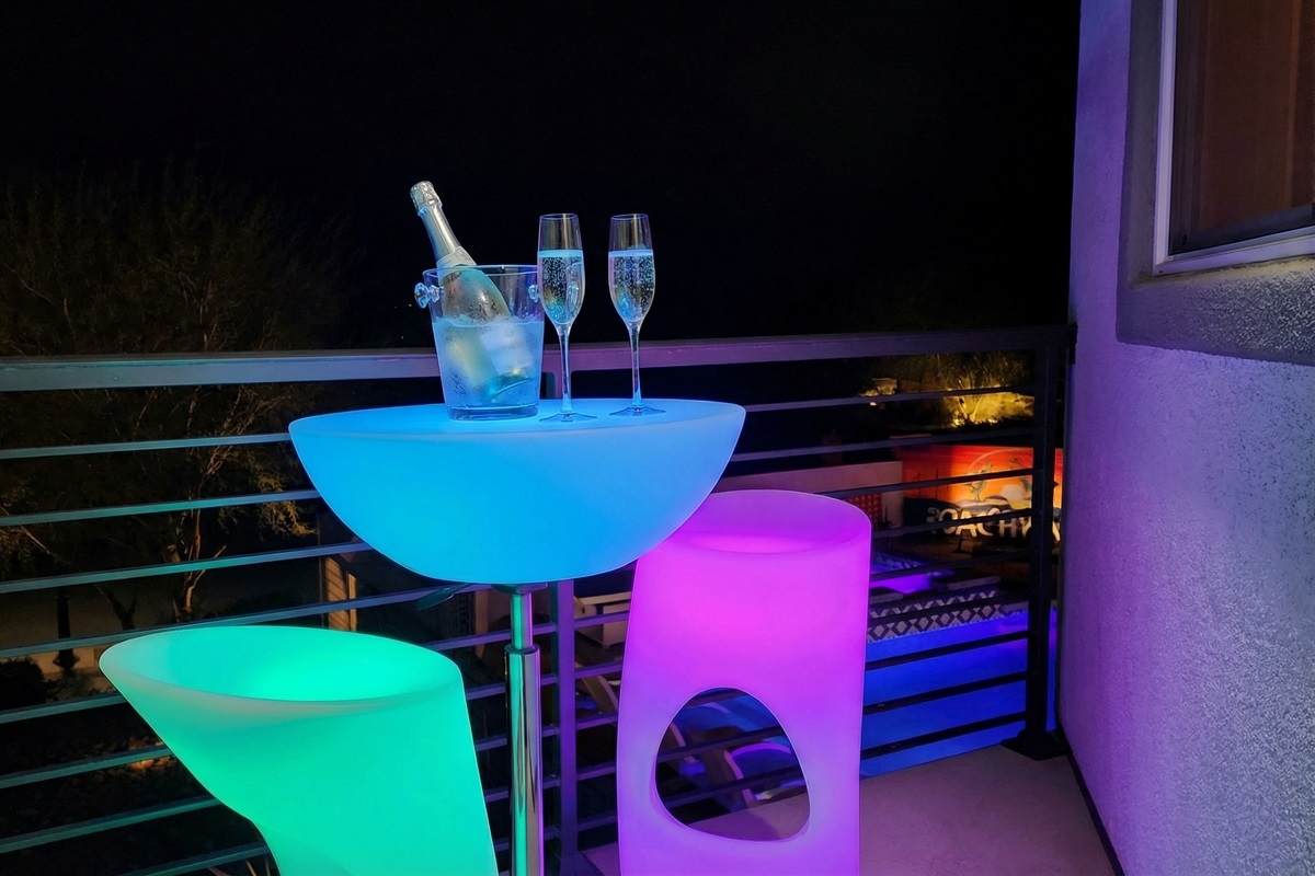 Upstairs patio overlooks the front courtyard and pool area.