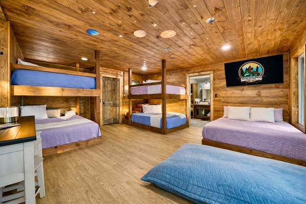 Bunk Loft with 5 queen beds. Perfect for a fun filled getaway.