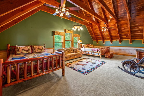 Loft Bedroom at Majestica Lodge: 1 king bed · 1 queen bed · 2 bunk beds