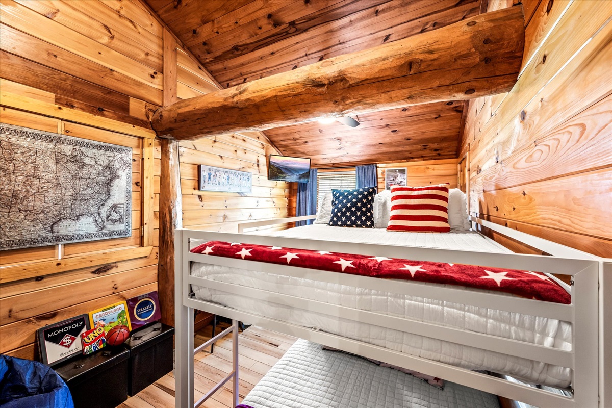 The kids room has a full-over-full bunk bed (fits 4 kids or 2 teens/adults). It also has 2 arcade machines, a mini basketball hoop, board games, and Jenga!
