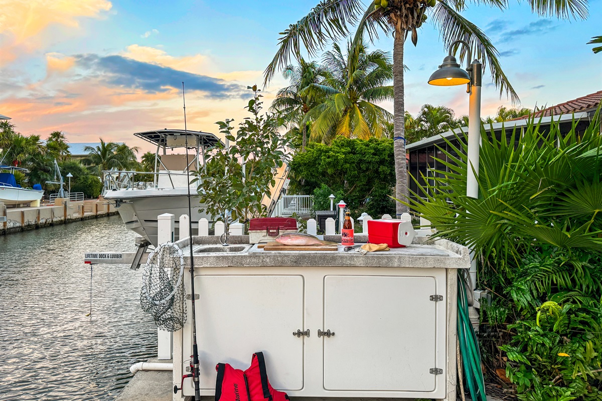 There's a professional set up to clean the day's fishing haul.