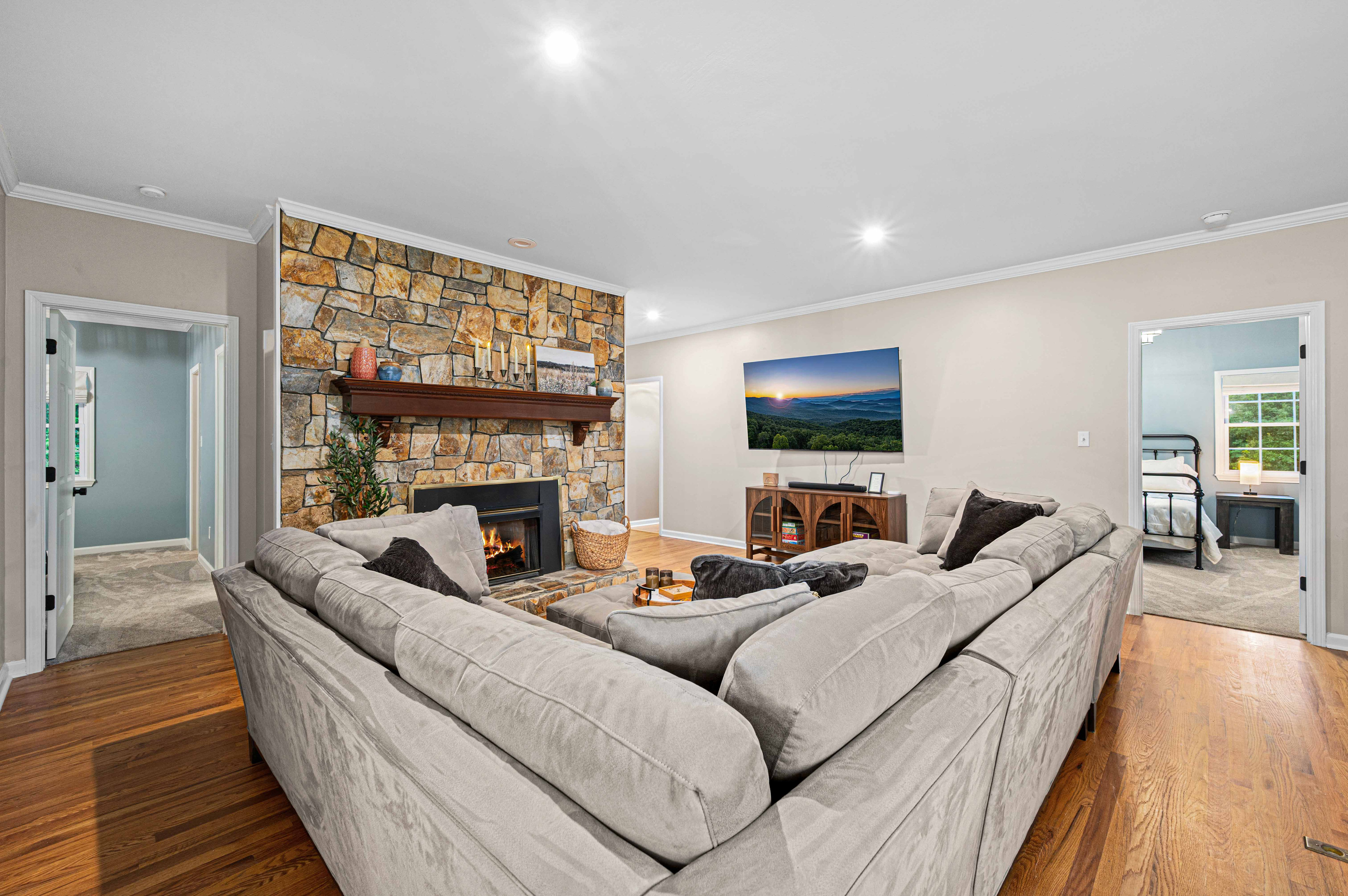Living Room: Gather around the stone fireplace for movie nights and mountain memories!