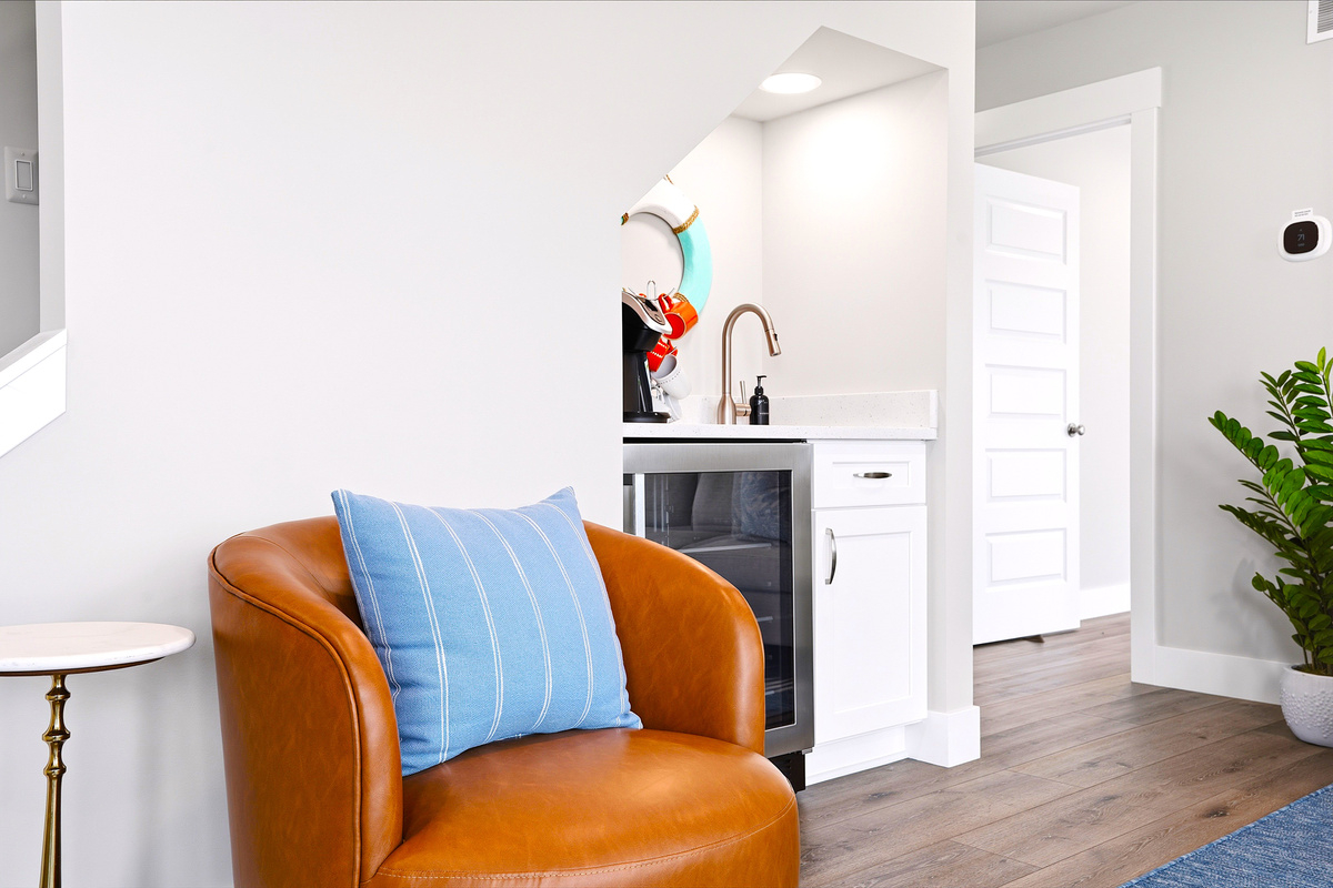 Enjoy the convenience of a built-in beverage station with a sink, drink fridge, Keurig, and traditional coffee maker—perfect for morning coffee or evening refreshments without heading downstairs.