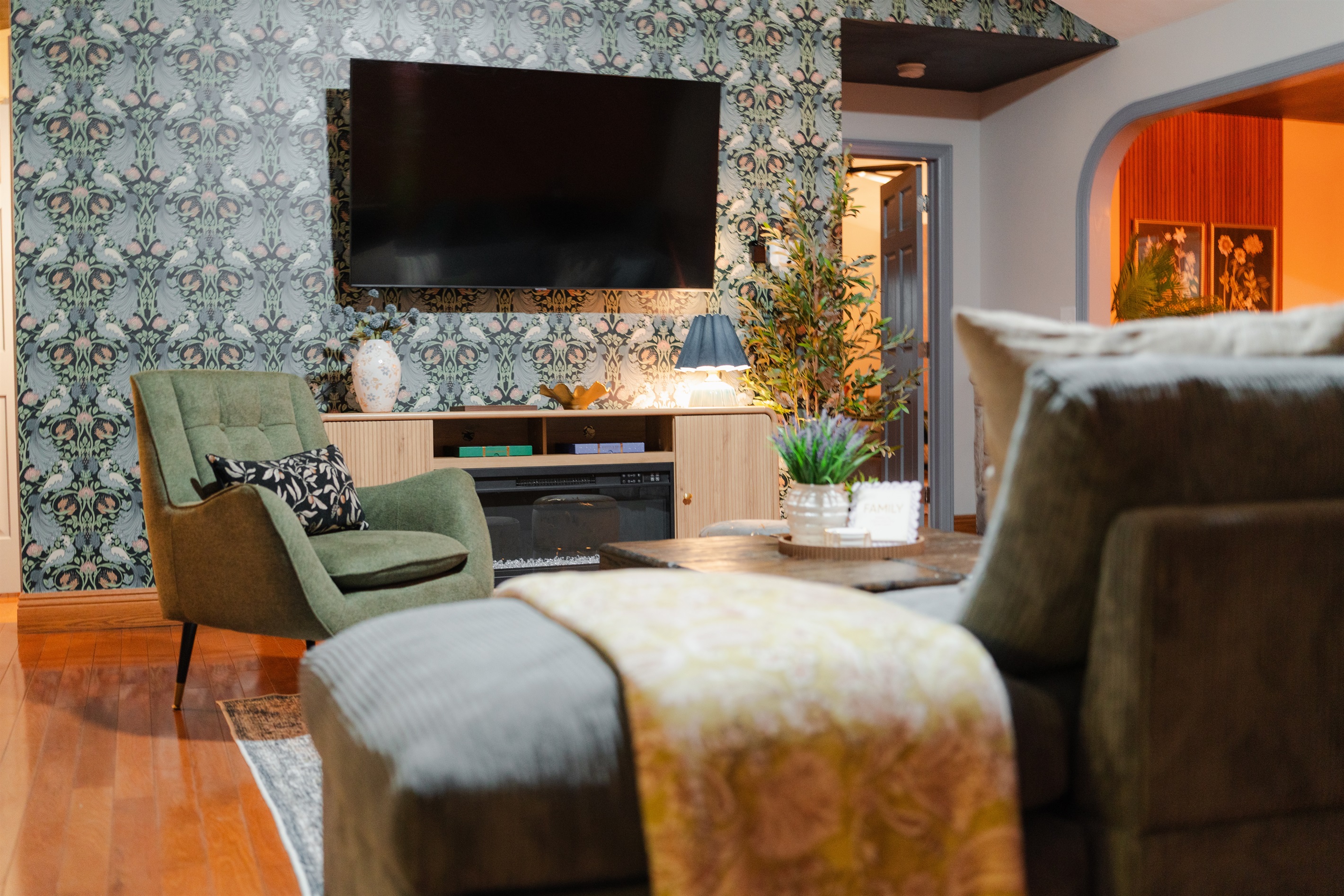 A comfortable living area with a large TV and plenty of space to relax indoors.