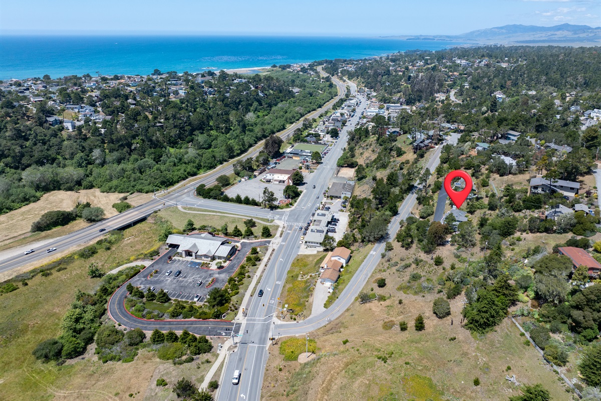 Elevated hillside retreat overlooking the coast and downtown.