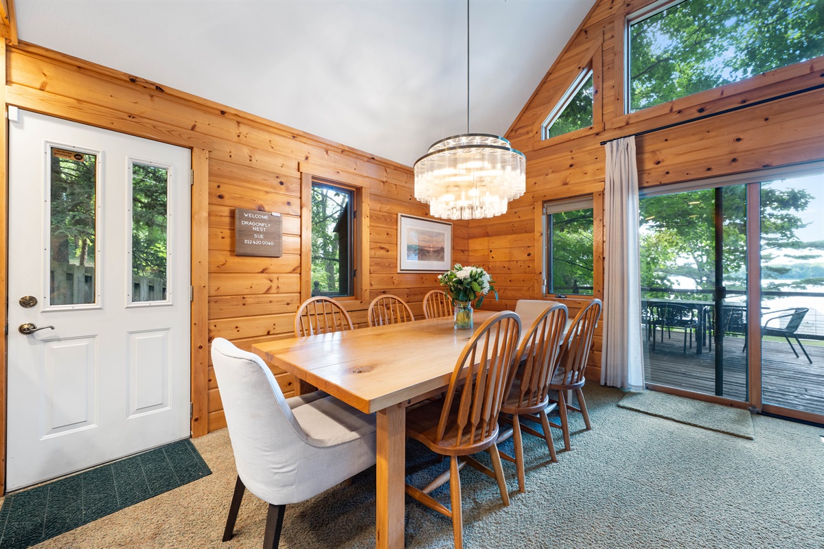 The dining table easily accommodates 8, while additional is available on the deck. It's a great space to enjoy a home-cooked meal and then a night of games!