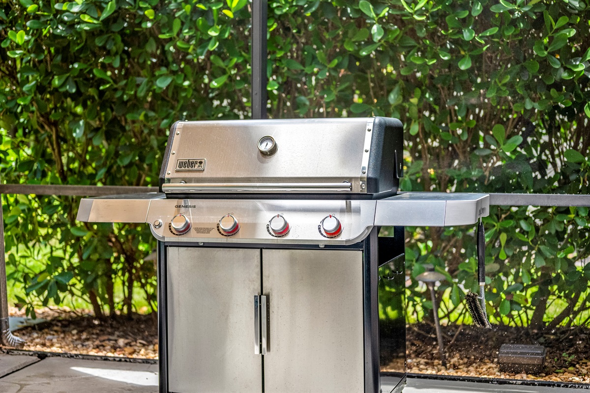 BBQ master? This Webber grill station and shaded setup have your name on it. Always a spare tank of propane if needed