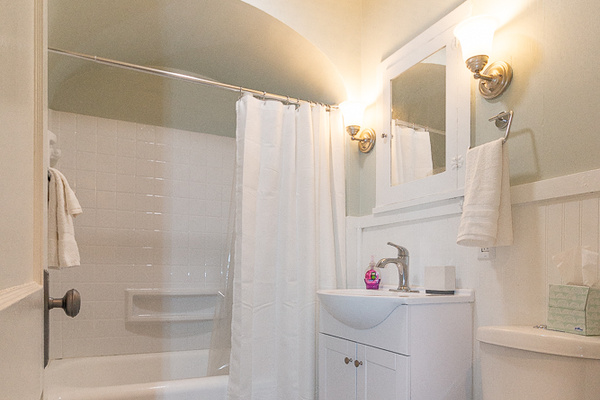 Enjoy a clean, well-appointed bathroom featuring a full tub and shower.
