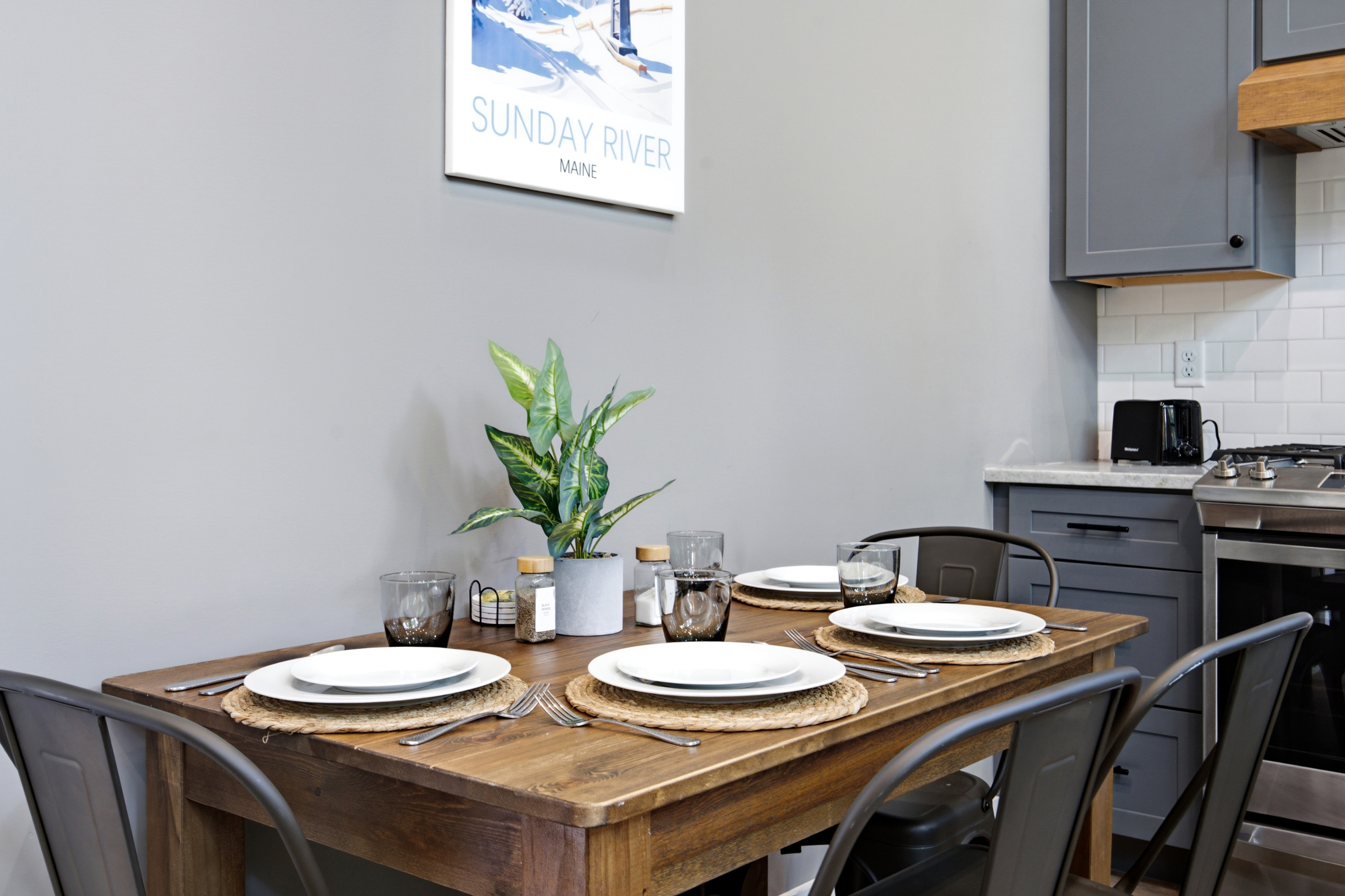 Share meals together around the dining table in a cozy, welcoming setting.