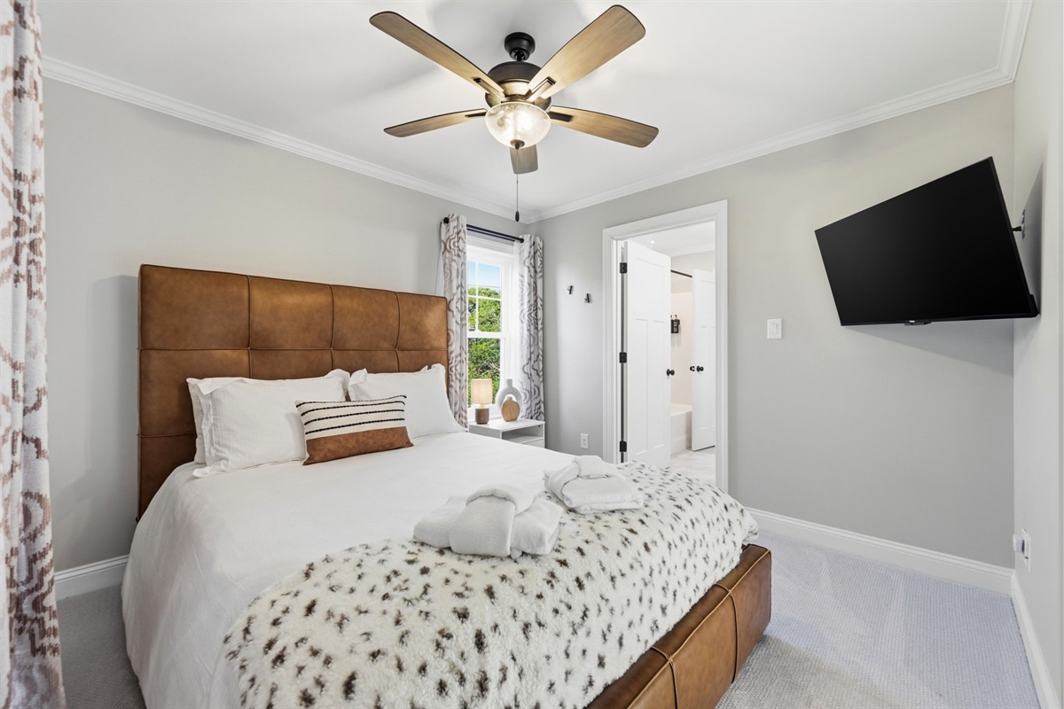 Cozy queen bedrooms designed for restful nights after beach days