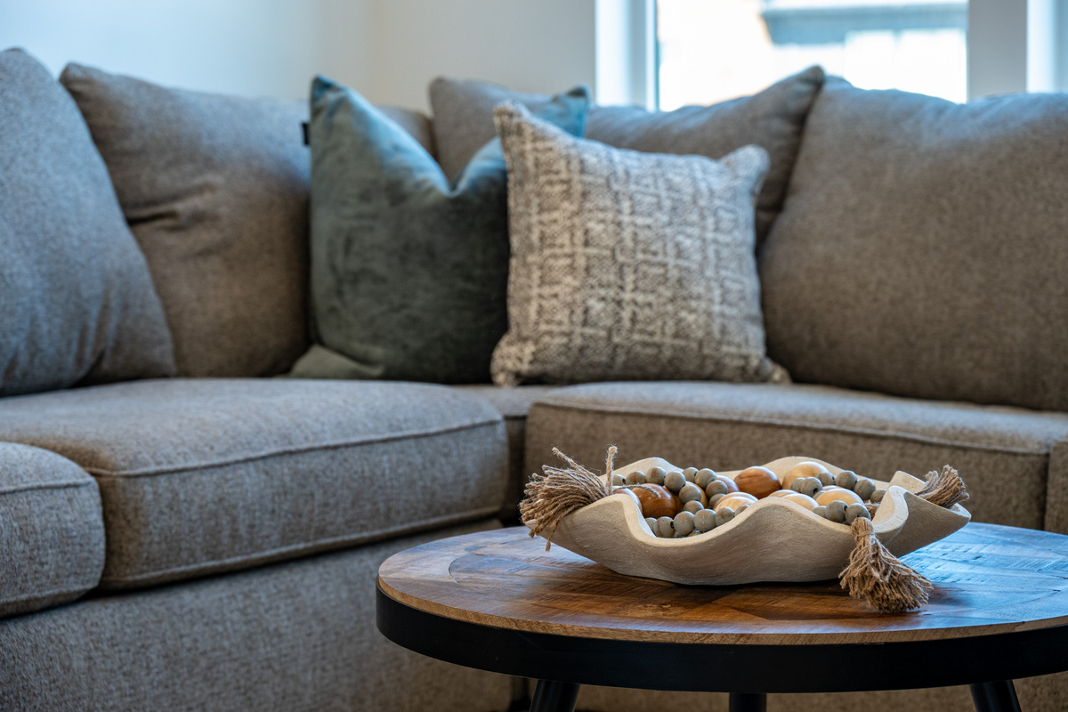 Comfortable seating and thoughtful details give the living area an inviting, lived-in feel without sacrificing style.