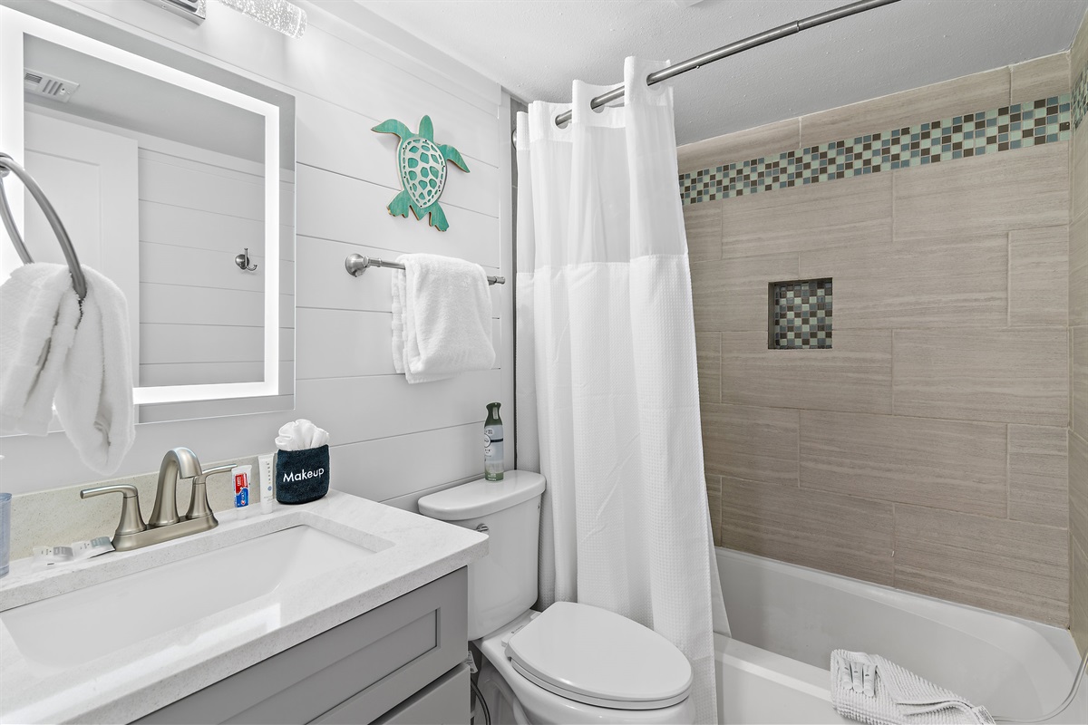 Costa Del Sol A-9: Bathroom for Bedroom 2 - Updated with Shower/Tub combo, new vanity, and back lit mirror!