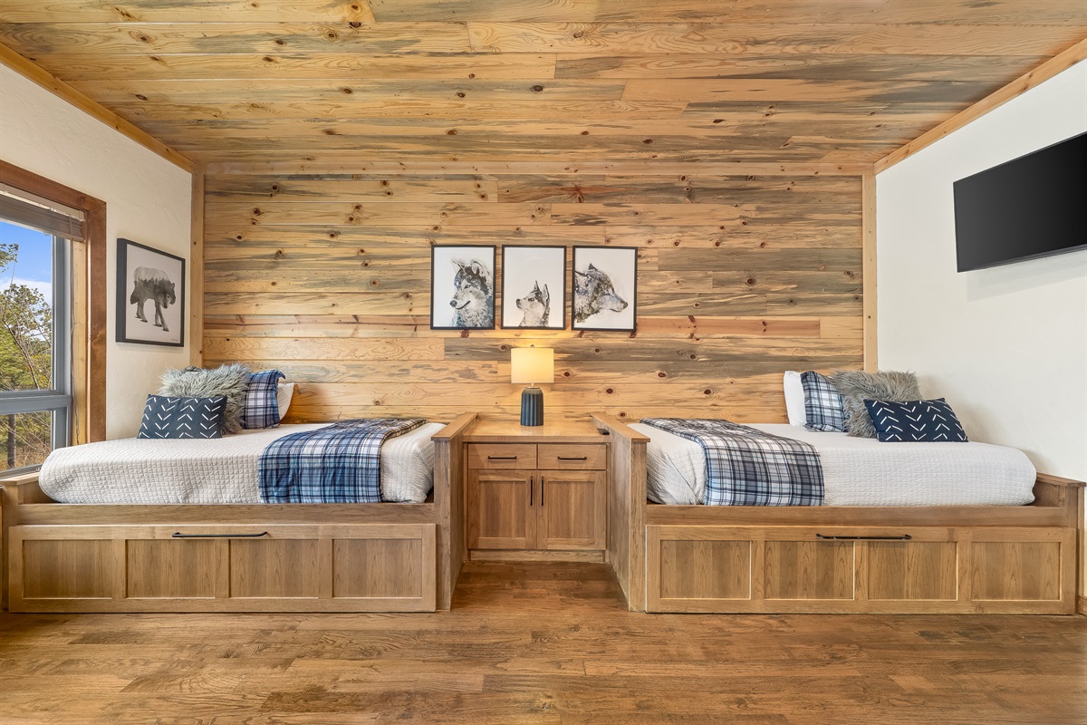 Captain's beds with twin trundles. The bunk room sleeps eight guests.