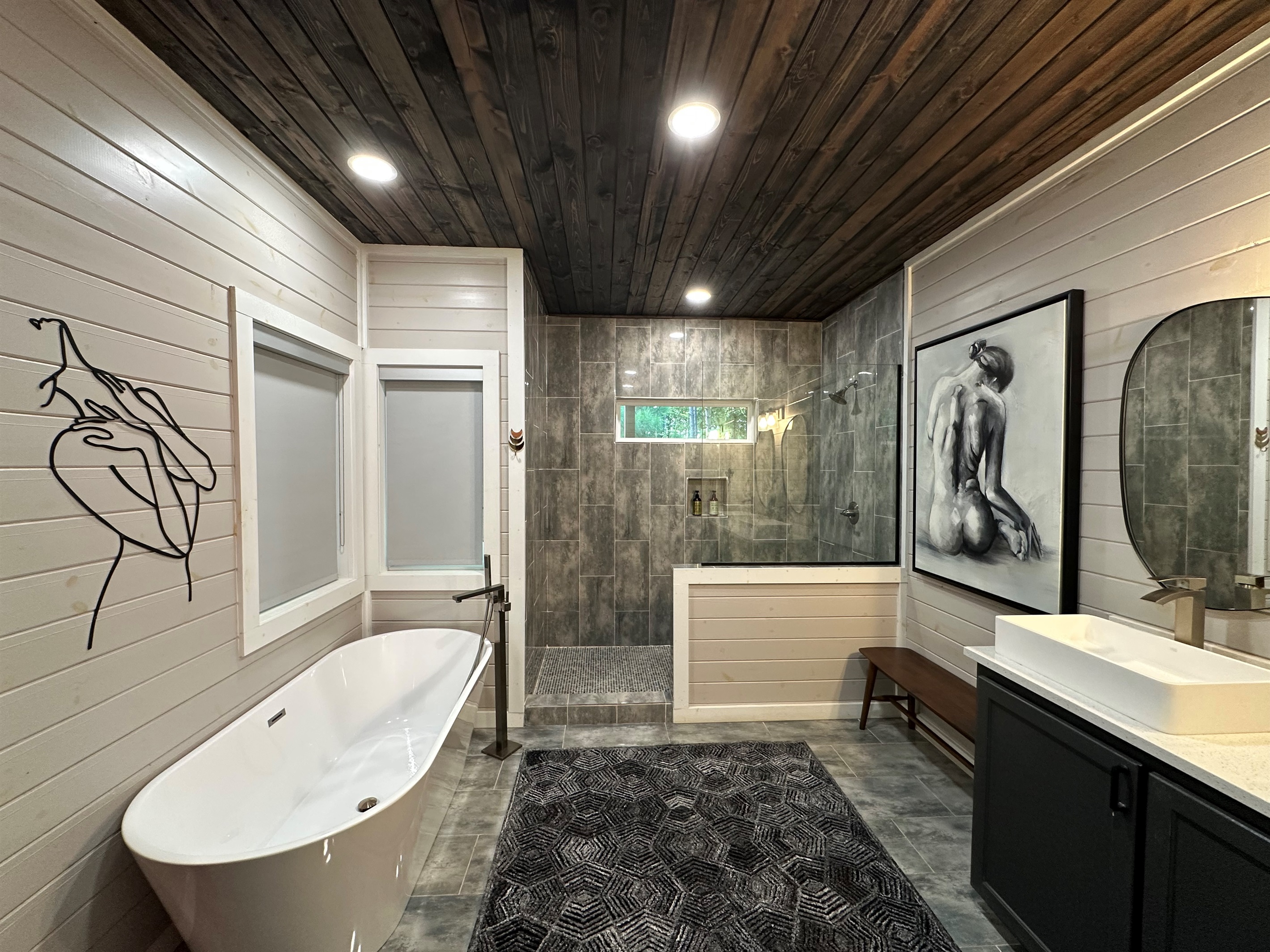 Oversized shower, soaking tub, and a few "Spicy" touches. 