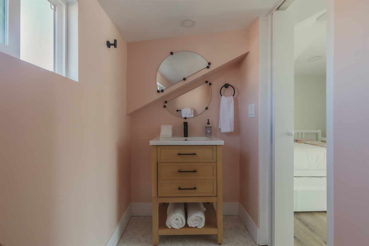 Our favorite corner for a fresh start 🌸 This cheerful little vanity nook makes even the smallest routines feel special. It’s one of many charming details of this Spanish style home.