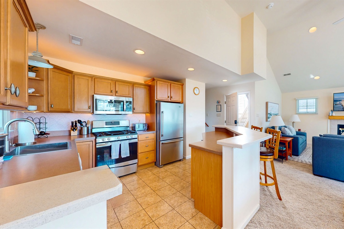 Spacious kitchen area with high end amenities 
