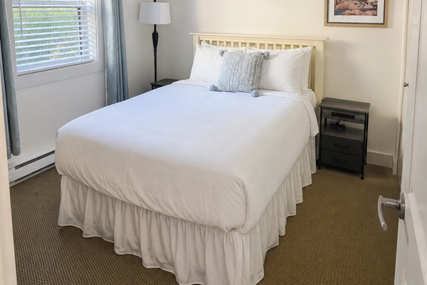 Main floor Double bedroom. Tons of storage located here as well.
