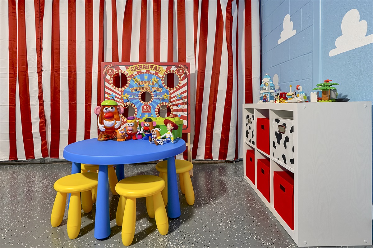 Duplo blocks, play figurines, and a perfect place to sit and create are a great way to keep your youngest guests entertained.