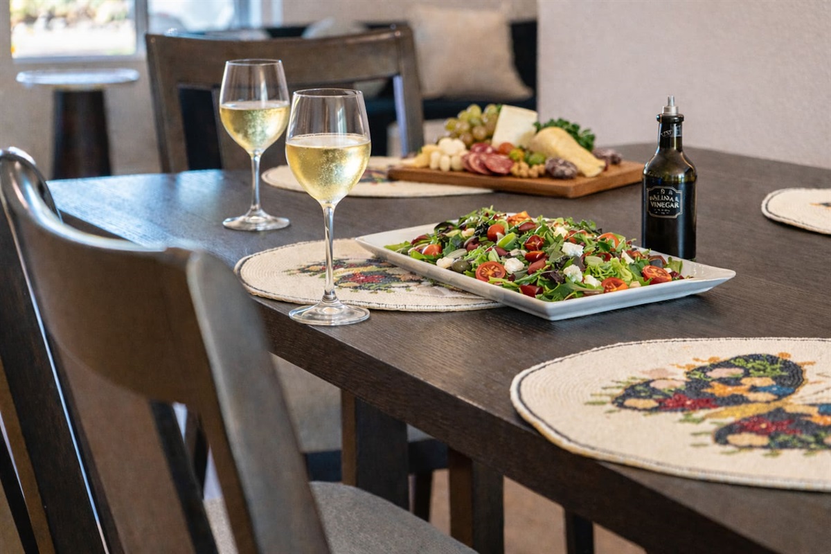 Enjoy meals together in a beautifully styled dining space—perfect for wine nights, charcuterie, and memorable gatherings