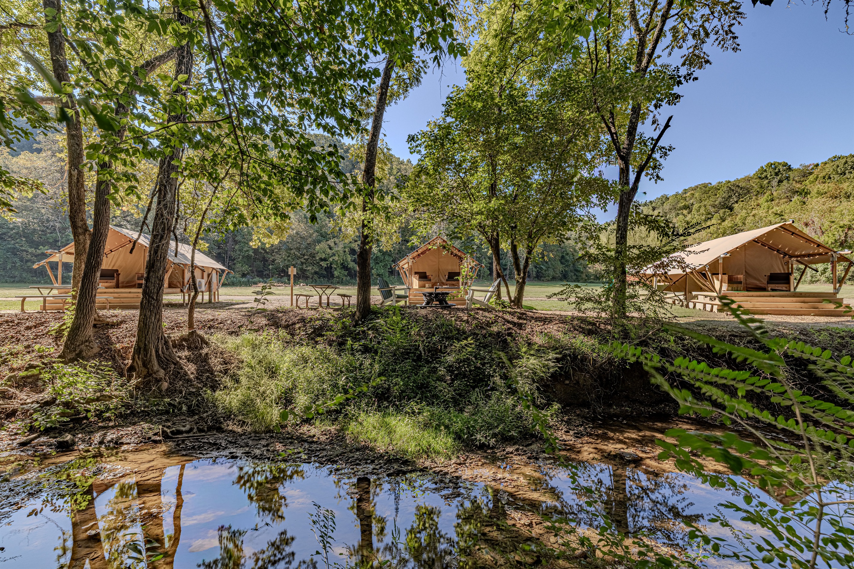 Creek-side living just got an upgrade. Wake up to the sound of running water and step out onto your private deck for a morning cup of coffee.