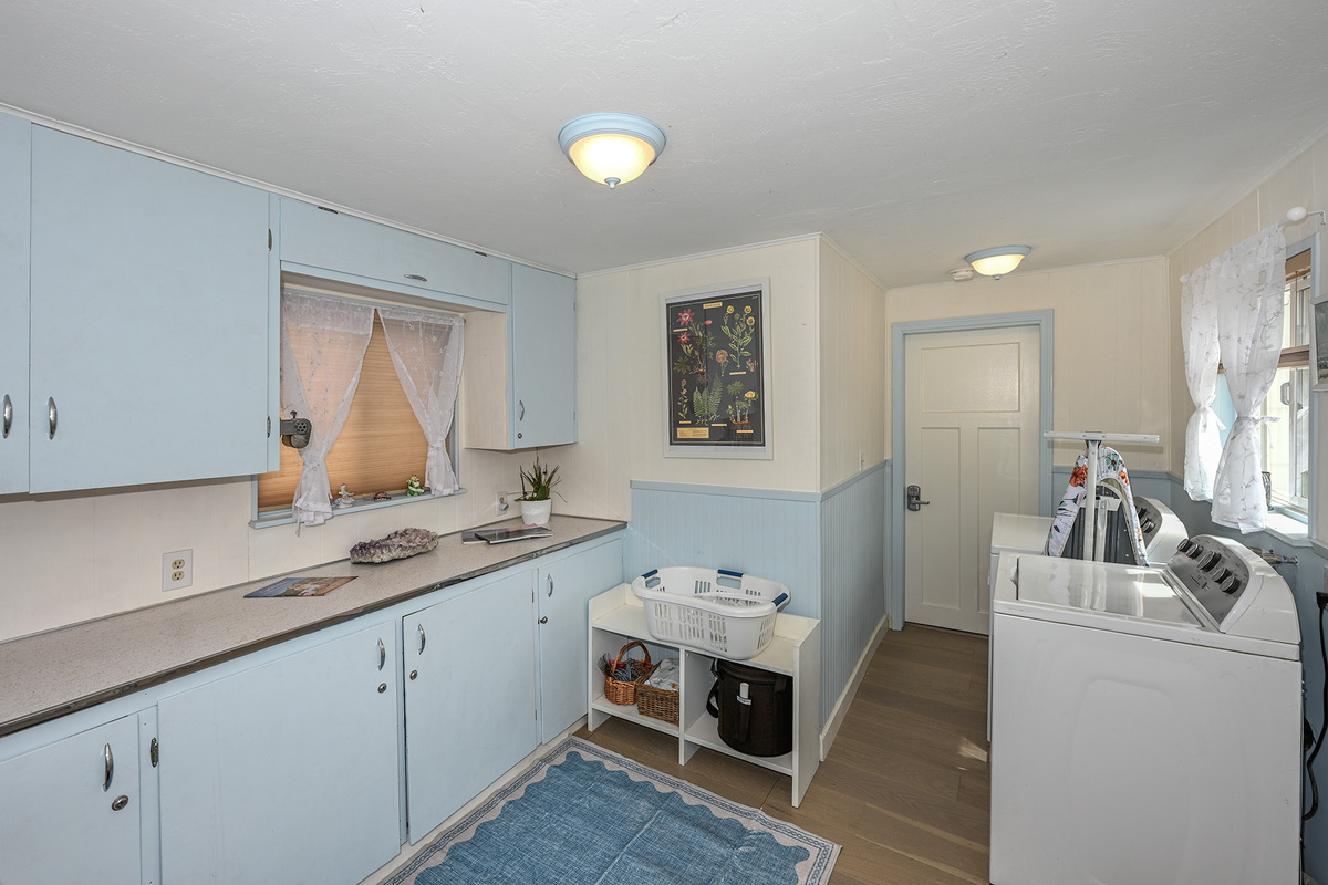 Full Laundry, Access Door from the rear parking lot and Entrance to the Moldavite Portal Room