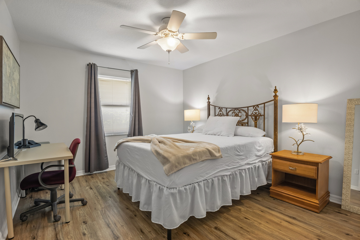 Unit #2 Right: Primary Bedroom & Office Desk. Queen size bed.