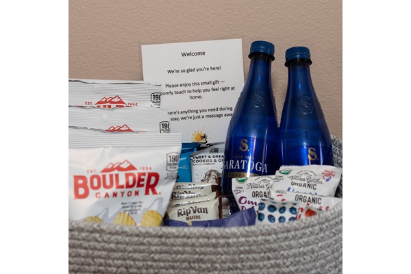 Welcome basket with complimentary snacks and drinks