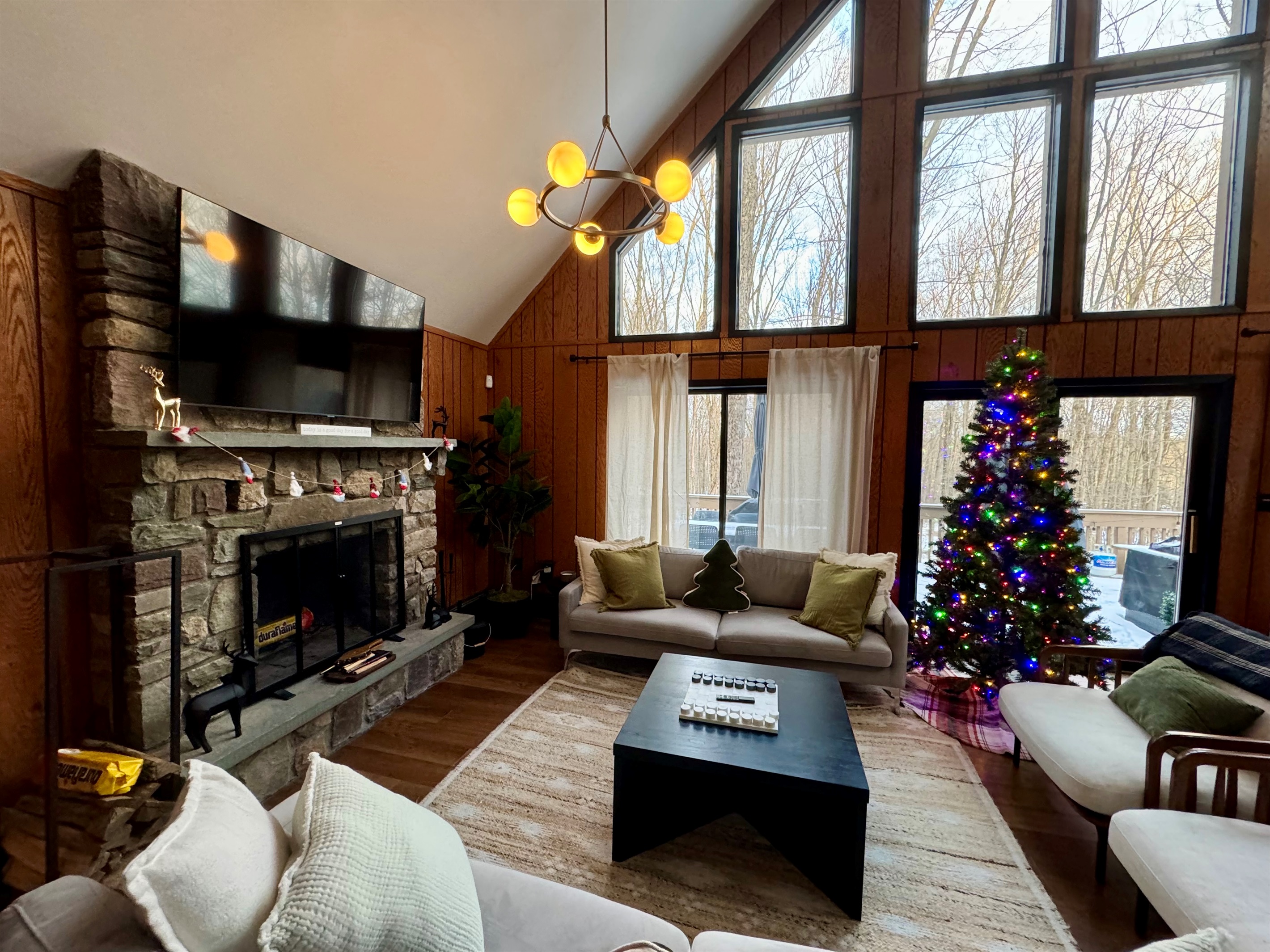“Holiday-ready great room — cozy fires, twinkle lights, and family cheer.”