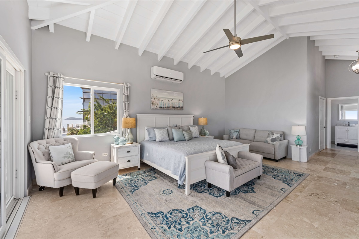 Relax in your private sanctuary with modern decor and cool tones.